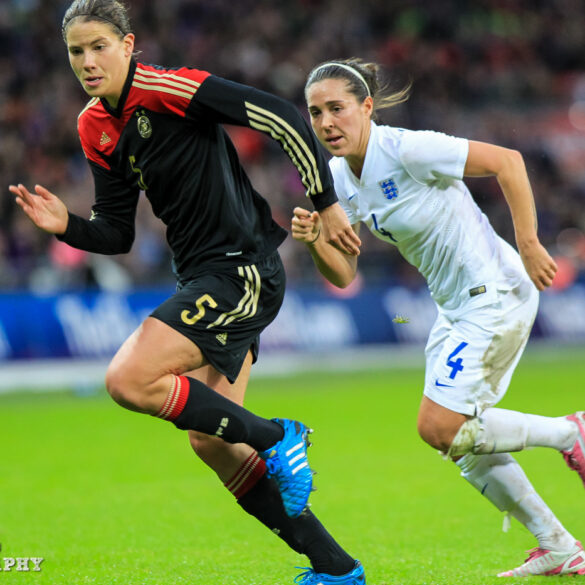 Gemany's Annike Krahn and England's Fara Williams at Wembley Stadium on November 23, 2014.