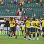 The Colombian and American teams after the match.